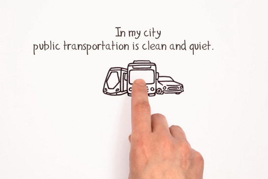 Zeichnung, eine S-Bahn, ein Bus und ein Auto nebeneinander. Ein Finger zeigt auf den Bus. 