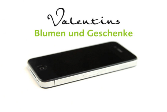 Eine Nahaufnahme von einem schwarzen Handy von Valentins Blumen und Geschenke